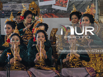 Pendet and Puspanjali dancers, accompanied by the Gong Kebyar art, enlivened the Pujawali ceremonies at the Parahyangan Agung Jagatkartta Te...