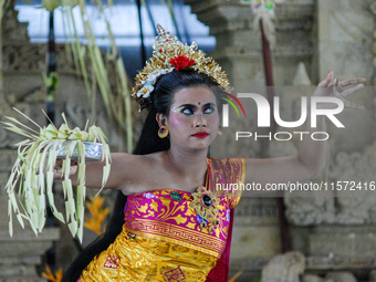 Pendet and Puspanjali dancers, accompanied by the Gong Kebyar art, enlivened the Pujawali ceremonies at the Parahyangan Agung Jagatkartta Te...