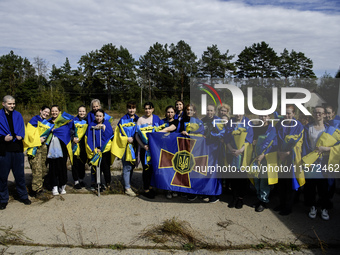 49 Ukrainian prisoners of war (POWs) return home following a prisoners of war swap with Russia in Chernihiv Region, Ukraine, on September 13...