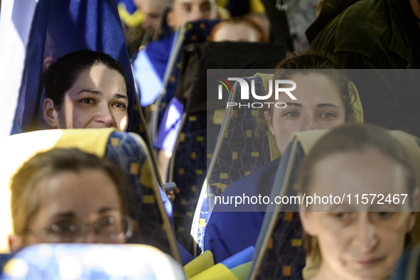 Ukrainian prisoners of war (POWs) react as they return to Ukraine from captivity after a swap with Russia in Chernihiv Region, Ukraine, on S...