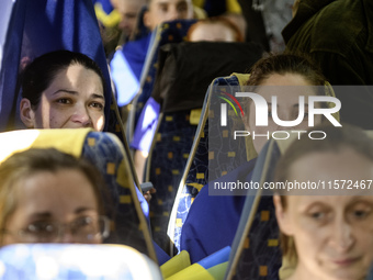 Ukrainian prisoners of war (POWs) react as they return to Ukraine from captivity after a swap with Russia in Chernihiv Region, Ukraine, on S...