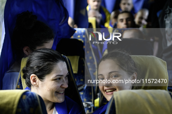 Ukrainian prisoners of war (POWs) react as they return to Ukraine from captivity after a swap with Russia in Chernihiv Region, Ukraine, on S...