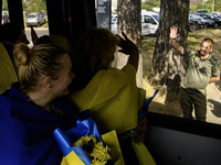 Ukrainian prisoners of war (POWs) react as they return to Ukraine from captivity after a swap with Russia in Chernihiv Region, Ukraine, on S...