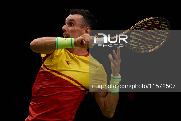 Roberto Bautista Agut of Spain is in action during the game against Arthur Fils of France during the 2024 Davis Cup Group B Stage match betw...