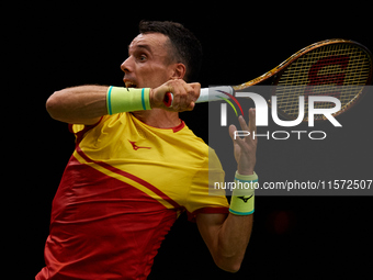 Roberto Bautista Agut of Spain is in action during the game against Arthur Fils of France during the 2024 Davis Cup Group B Stage match betw...