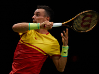 Roberto Bautista Agut of Spain is in action during the game against Arthur Fils of France during the 2024 Davis Cup Group B Stage match betw...