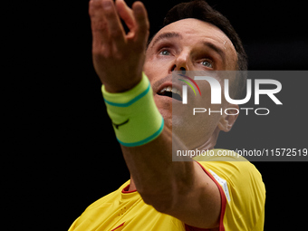 Roberto Bautista Agut of Spain serves during the game against Arthur Fils of France during the 2024 Davis Cup Group B Stage match between Fr...