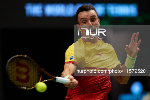 Roberto Bautista Agut of Spain is in action during the game against Arthur Fils of France during the 2024 Davis Cup Group B Stage match betw...