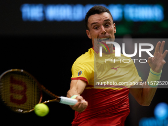 Roberto Bautista Agut of Spain is in action during the game against Arthur Fils of France during the 2024 Davis Cup Group B Stage match betw...