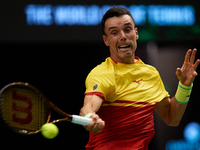 Roberto Bautista Agut of Spain is in action during the game against Arthur Fils of France during the 2024 Davis Cup Group B Stage match betw...