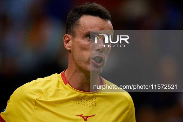 Roberto Bautista Agut of Spain reacts during the game against Arthur Fils of France during the 2024 Davis Cup Group B Stage match between Fr...