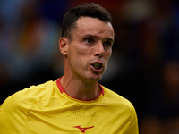 Roberto Bautista Agut of Spain reacts during the game against Arthur Fils of France during the 2024 Davis Cup Group B Stage match between Fr...