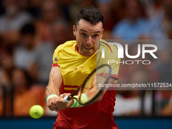 Roberto Bautista Agut of Spain is in action during the game against Arthur Fils of France during the 2024 Davis Cup Group B Stage match betw...