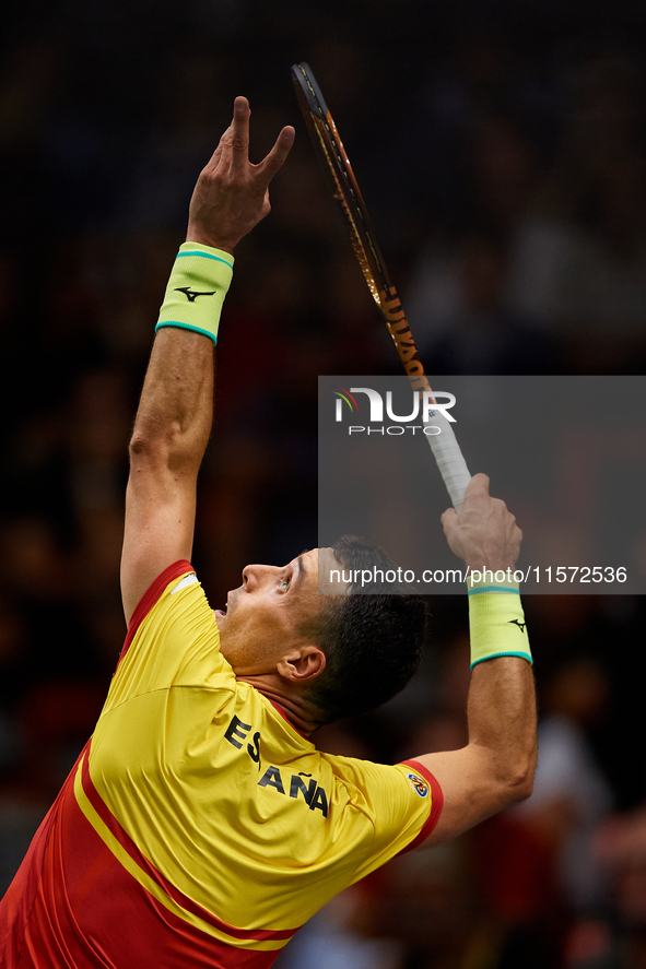 Roberto Bautista Agut of Spain serves during the game against Arthur Fils of France during the 2024 Davis Cup Group B Stage match between Fr...