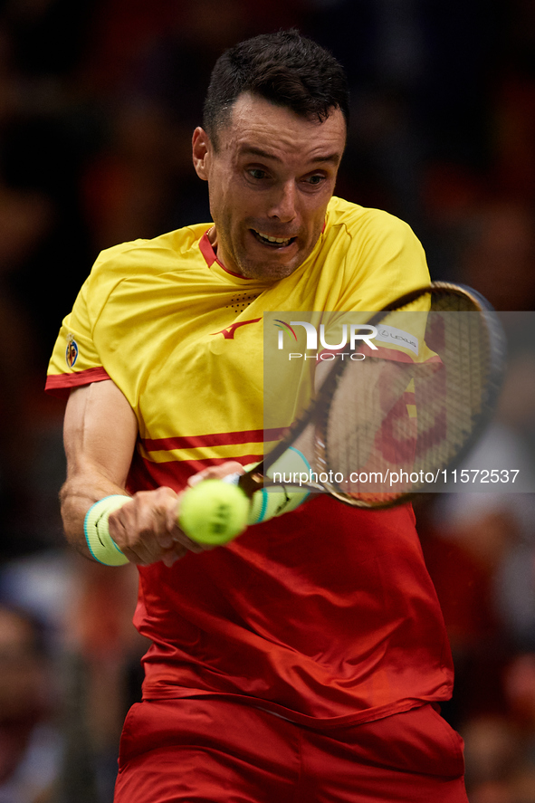 Roberto Bautista Agut of Spain is in action during the game against Arthur Fils of France during the 2024 Davis Cup Group B Stage match betw...