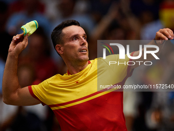 Roberto Bautista Agut of Spain throws his wristband to the crowd following the game against Arthur Fils of France during the 2024 Davis Cup...