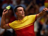 Roberto Bautista Agut of Spain throws his wristband to the crowd following the game against Arthur Fils of France during the 2024 Davis Cup...