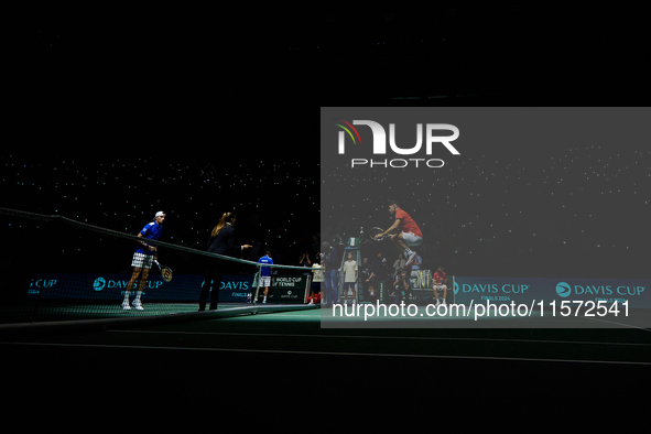 Carlos Alcaraz of Spain jumps prior to the game against Ugo Humbert of France during the 2024 Davis Cup Group B Stage match between France a...