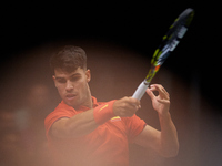 Carlos Alcaraz of Spain plays against Ugo Humbert of France during the 2024 Davis Cup Group B Stage match between France and Spain at Pabell...