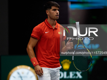 Carlos Alcaraz of Spain plays with the racket during the game against Ugo Humbert of France during the 2024 Davis Cup Group B Stage match be...