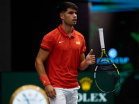 Carlos Alcaraz of Spain plays with the racket during the game against Ugo Humbert of France during the 2024 Davis Cup Group B Stage match be...