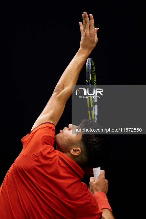 Carlos Alcaraz of Spain serves during the game against Ugo Humbert of France during the 2024 Davis Cup Group B Stage match between France an...