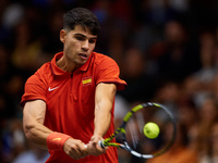 Carlos Alcaraz of Spain plays against Ugo Humbert of France during the 2024 Davis Cup Group B Stage match between France and Spain at Pabell...