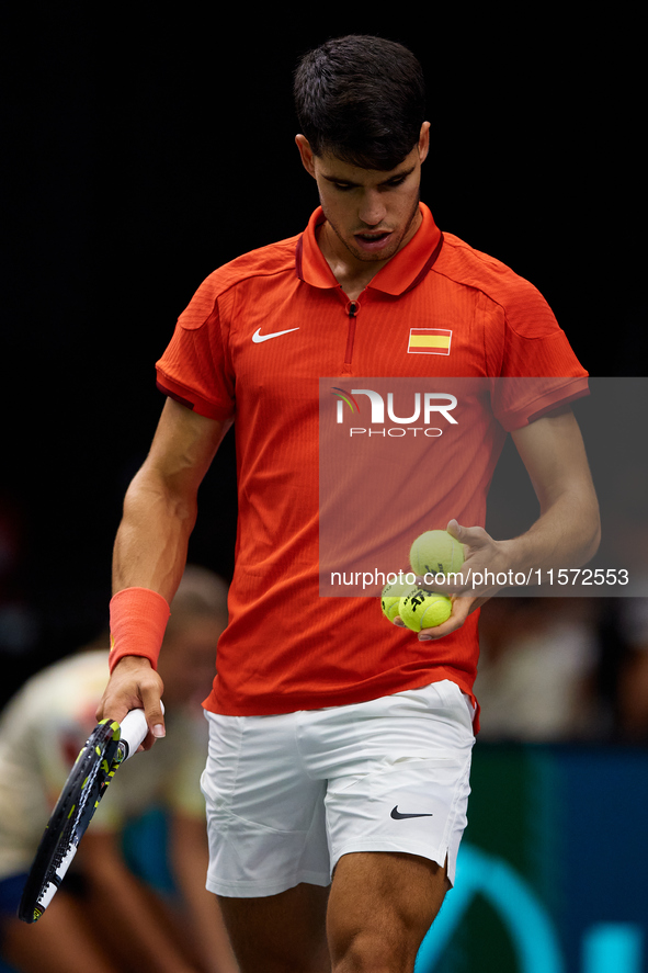 Carlos Alcaraz of Spain looks on during the game against Ugo Humbert of France during the 2024 Davis Cup Group B Stage match between France...