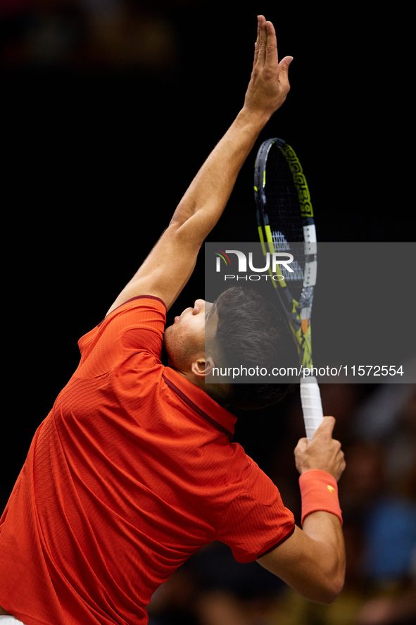 Carlos Alcaraz of Spain serves during the game against Ugo Humbert of France during the 2024 Davis Cup Group B Stage match between France an...