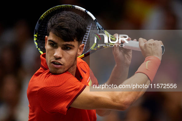 Carlos Alcaraz of Spain plays against Ugo Humbert of France during the 2024 Davis Cup Group B Stage match between France and Spain at Pabell...