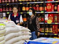 Consumers shop at a supermarket in Qingzhou, China, on September 9, 2024. On September 14, 2024, the National Bureau of Statistics releases...