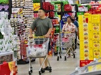 Consumers shop at a supermarket in Qingzhou, China, on September 9, 2024. On September 14, 2024, the National Bureau of Statistics releases...