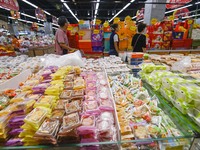 Consumers shop at a supermarket in Qingzhou, China, on September 9, 2024. On September 14, 2024, the National Bureau of Statistics releases...