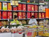 Consumers shop at a supermarket in Qingzhou, China, on September 9, 2024. On September 14, 2024, the National Bureau of Statistics releases...