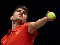 Carlos Alcaraz of Spain serves during the game against Ugo Humbert of France during the 2024 Davis Cup Group B Stage match between France an...