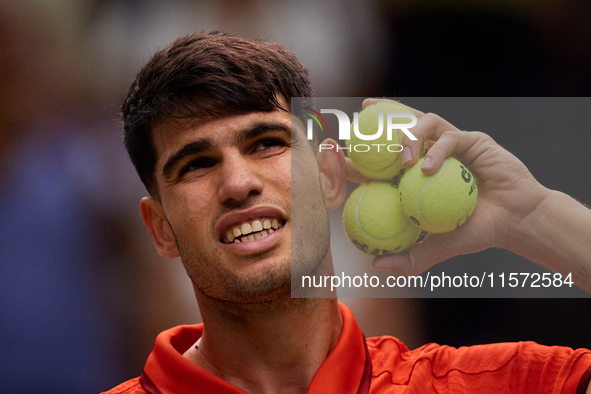 Carlos Alcaraz of Spain reacts following the game against Ugo Humbert of France during the 2024 Davis Cup Group B Stage match between France...