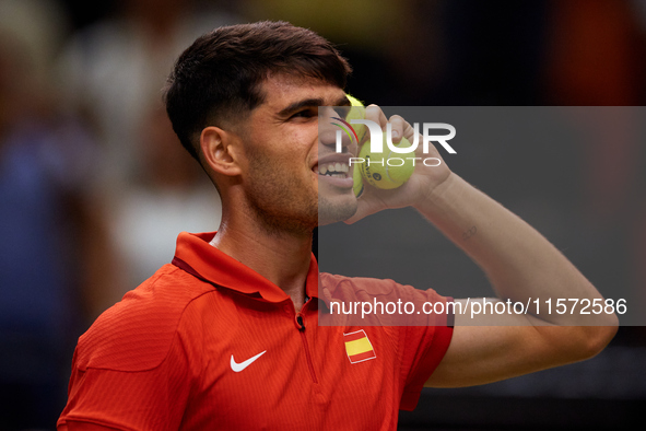 Carlos Alcaraz of Spain reacts following the game against Ugo Humbert of France during the 2024 Davis Cup Group B Stage match between France...