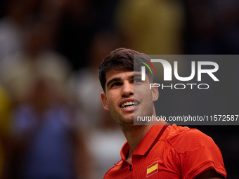 Carlos Alcaraz of Spain smiles following the game against Ugo Humbert of France during the 2024 Davis Cup Group B Stage match between France...