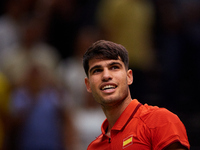 Carlos Alcaraz of Spain smiles following the game against Ugo Humbert of France during the 2024 Davis Cup Group B Stage match between France...