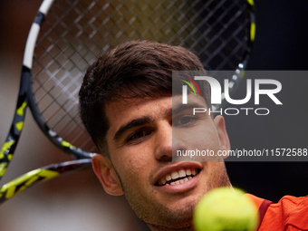 Carlos Alcaraz of Spain throws a ball to the crowd following the game against Ugo Humbert of France during the 2024 Davis Cup Group B Stage...