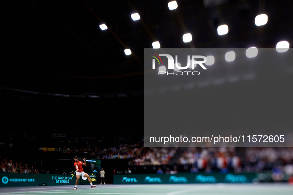 Carlos Alcaraz of Spain plays against Ugo Humbert of France during the 2024 Davis Cup Group B Stage match between France and Spain at Pabell...