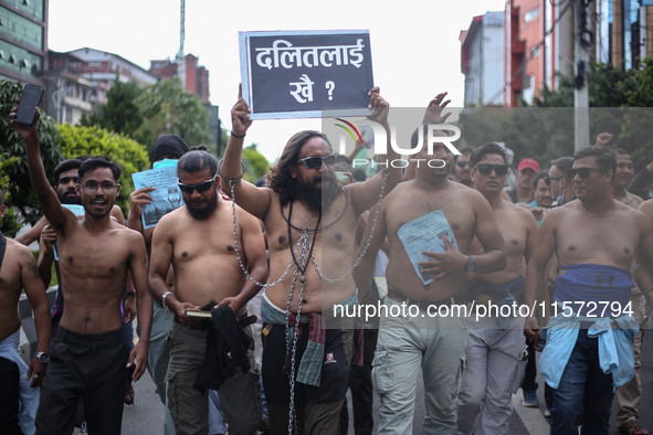 Nepali Dalit rights activists hold a demonstration in Kathmandu, Nepal, on September 14, 2024, demanding the implementation of constitutiona...