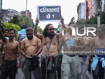 Nepali Dalit rights activists hold a demonstration in Kathmandu, Nepal, on September 14, 2024, demanding the implementation of constitutiona...