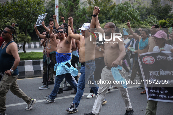 Nepali Dalit rights activists hold a demonstration in Kathmandu, Nepal, on September 14, 2024, demanding the implementation of constitutiona...