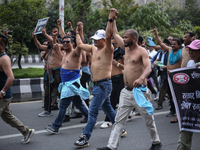 Nepali Dalit rights activists hold a demonstration in Kathmandu, Nepal, on September 14, 2024, demanding the implementation of constitutiona...