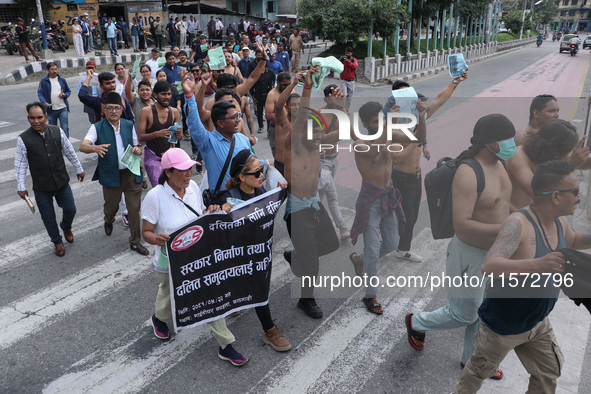 Nepali Dalit rights activists hold a demonstration in Kathmandu, Nepal, on September 14, 2024, demanding the implementation of constitutiona...