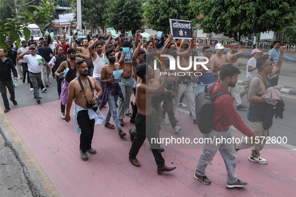 Nepali Dalit rights activists hold a demonstration in Kathmandu, Nepal, on September 14, 2024, demanding the implementation of constitutiona...