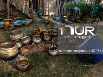 Traditional Kashmiri chefs cut lamb meat to prepare wazwan dishes in Sopore, Jammu and Kashmir, India, on September 14, 2024. Wazwan is a tr...