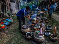 Traditional Kashmiri chefs cut lamb meat to prepare wazwan dishes in Sopore, Jammu and Kashmir, India, on September 14, 2024. Wazwan is a tr...