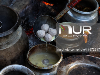 Traditional Kashmiri chefs cut lamb meat to prepare wazwan dishes in Sopore, Jammu and Kashmir, India, on September 14, 2024. Wazwan is a tr...